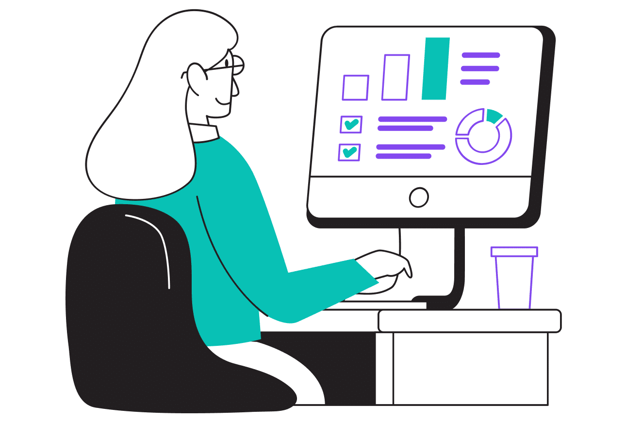 A woman working on a computer, focused on a chart displayed on the screen.