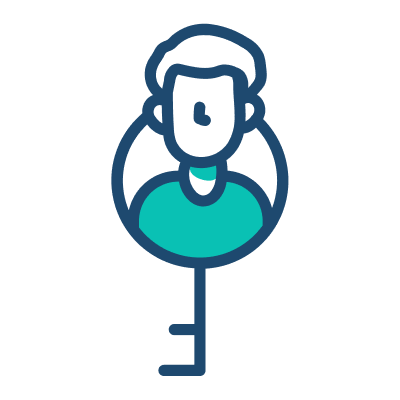 A man holding a key in his hand, looking thoughtfully at it.