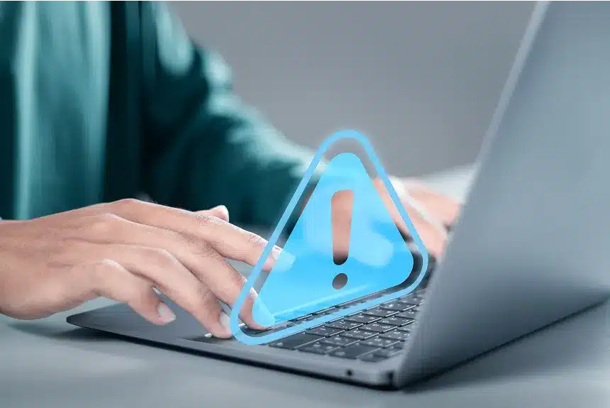 Image illustrating strategies for safeguarding a business against cyber attacks, featuring a shield and digital security icons.