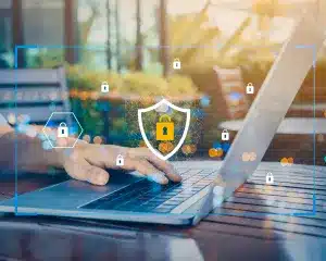 A laptop displaying security and privacy protection symbols, emphasizing digital safety and data confidentiality.