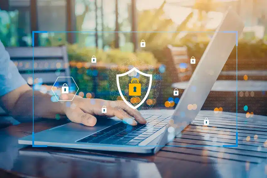 Image illustrating strategies for safeguarding a business against cyber attacks, featuring a shield and digital security icons.