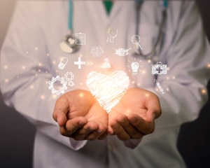 A doctor holds a heart surrounded by various health-related icons, symbolizing care and medical expertise.