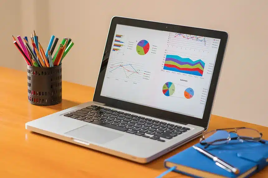 A laptop displaying a graph on its screen, illustrating data trends and analysis.