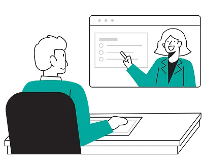 A man sits at a desk with a computer, while a woman stands behind him, both engaged in a work-related discussion.